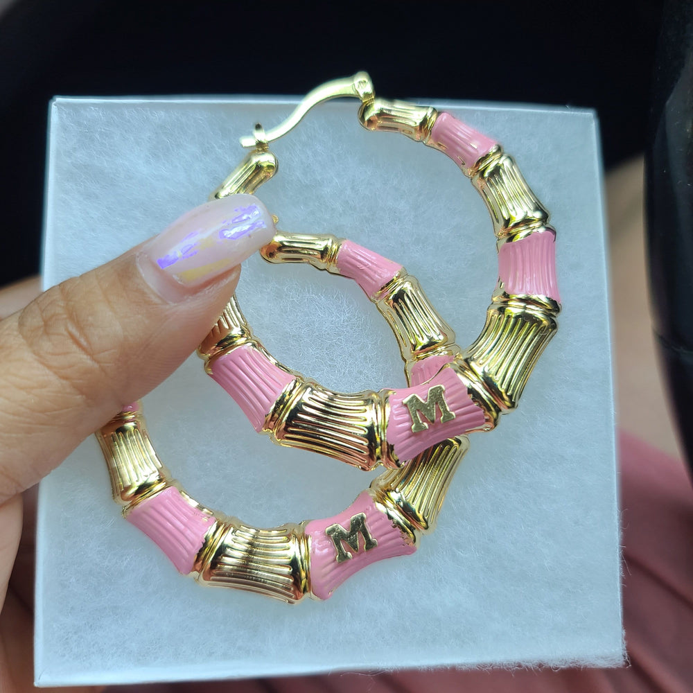 
                      
                        Chola Boss Initial Bamboo Hoop Earrings
                      
                    
