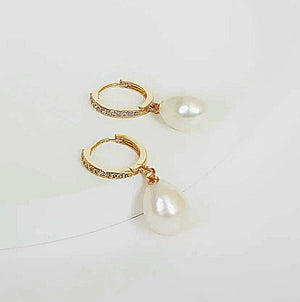 
                
                    Load image into Gallery viewer, Pearl Cz Mini Hoop Earrings
                
            
