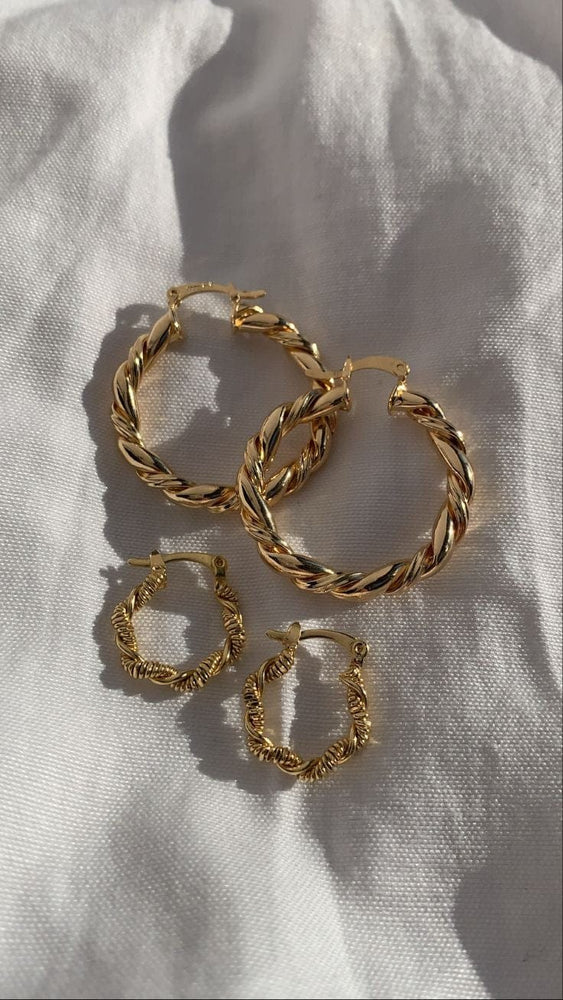 
                      
                        Twisted Small Gold Hoop Earrings
                      
                    