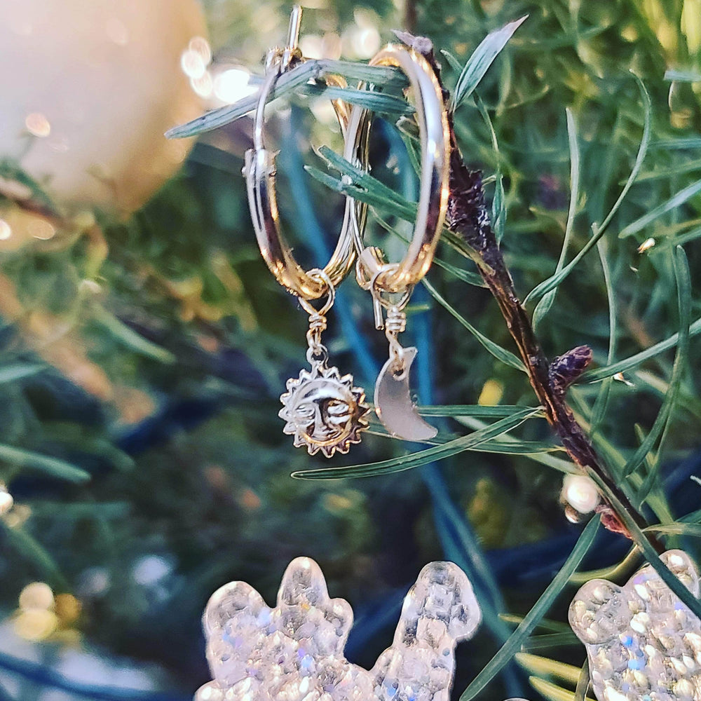 
                      
                        Sol y Luna Hoop Earrings
                      
                    